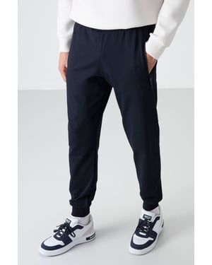 Herrsolid färgad sweatpants med dragkedja ficka
