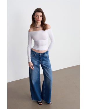 Lågmidjade vida jeans i bomulldenim