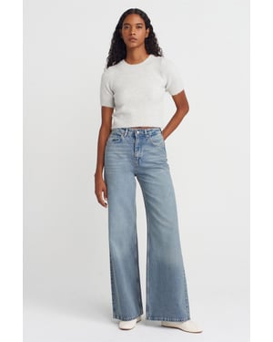 Högmidjade vida jeans i bomulldenim