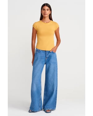 Högmidjade vida denimjeans