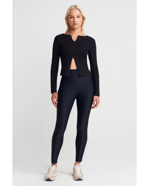 High-Waisted Skinny Leggings met Ritsdetails