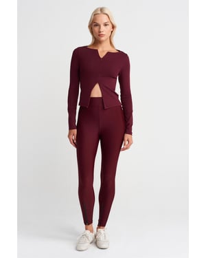 High-Waisted Skinny Legging met Ritsdetails