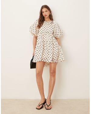 YAS ballon sleeve voluminous mini dress in cream with black polka dot