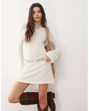 Reclaimed Vintage flared sleeve crochet beach mini dress in cream