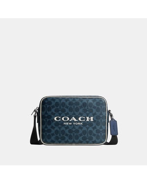 Colton Crossbody Bag 25 In Signature Canvas With Coach Graphic
