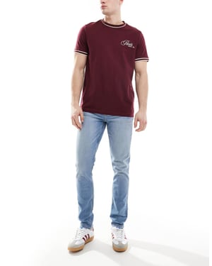 ASOS DESIGN skinny jeans in mid wash blue