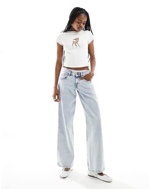 Motel parallel leg low rise jeans in 80s light blue wash