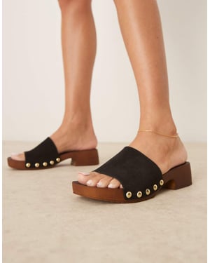 ASOS DESIGN Flare premium suede mule sandal clogs in black