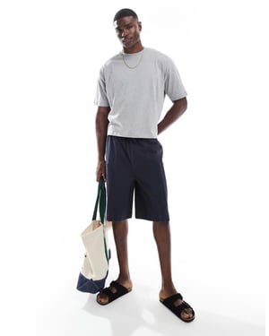 ASOS DESIGN long length canvas cargo shorts in washed navy