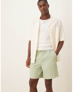 ASOS DESIGN mid length waffle short in green