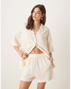 ASOS DESIGN cheesecloth pull on shorts with raw edge detail co-ord in buttermilk