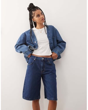 Reclaimed Vintage denim jort in mid blue wash