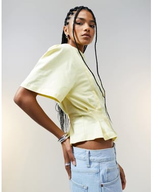 ASOS DESIGN seam detail short sleeve corset waist t-shirt in buttermilk