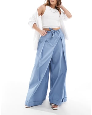 ASOS DESIGN super wide leg trousers with tie belt in blue