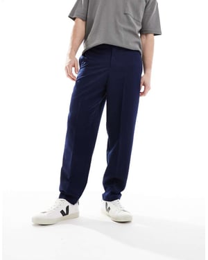 ASOS DESIGN smart relaxed tapered fit trousers in navy