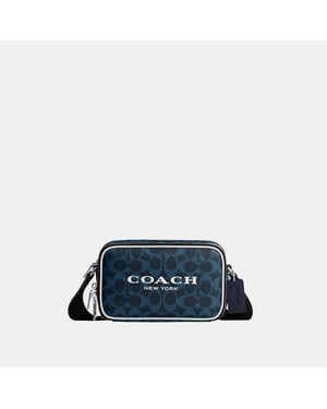 Colton Crossbody Bag 19 In Signature Canvas With Coach Graphic