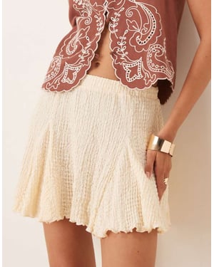 ASOS DESIGN texture godet mini skirt in ivory