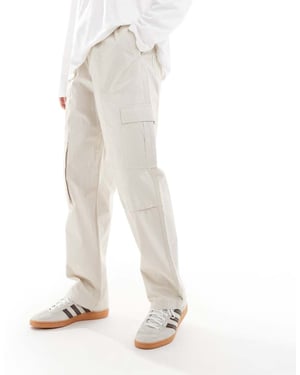 ASOS DESIGN baggy pull on cargo trousers in stone