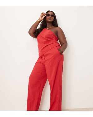 ASOS DESIGN Curve tailored flower textured relaxed trousers co-ord in red
