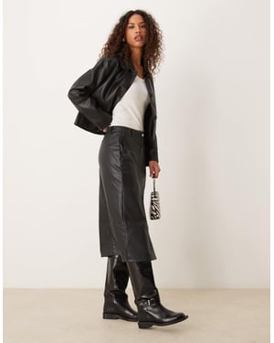 JDY faux leather midi skirt in black