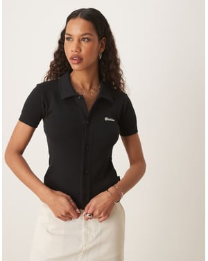 Dickies tallasse knäppt baby t-shirt i svart