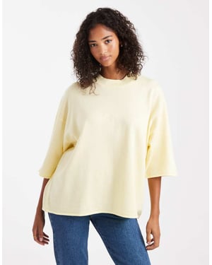 ASOS DESIGN stickad strukturerad t-shirt i buttermilk