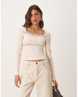 ASOS DESIGN ribbad långärmad topp med spets- och knappar i cream