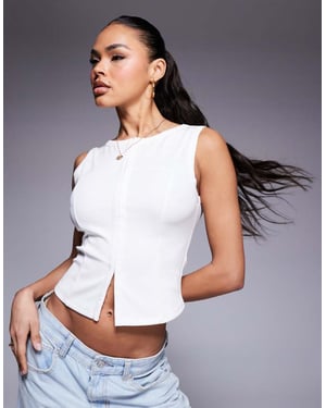 ASOS DESIGN krok- och ögla rundad fåll ribbad topp i elfenben