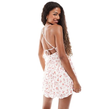Hollister spaghetti strap babydoll jumpsuit i röd blommig