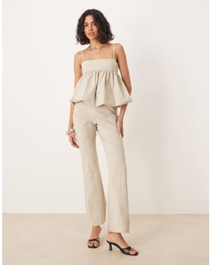 ASOS DESIGN strukturerad peplum jumpsuit i elfenben