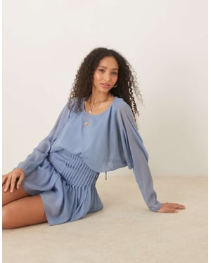 ASOS DESIGN draperad rygg plisséad byxdress i dämpad blå