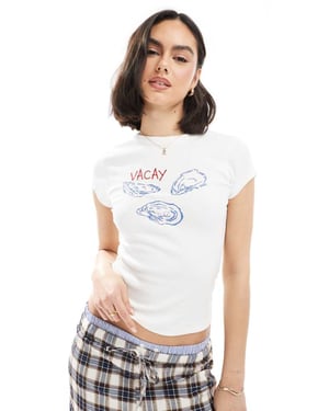 ASOS DESIGN ribbed baby tee with oyster graphic in white