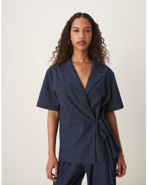 ASOS DESIGN denim look tie front revere shirt in pinstripe