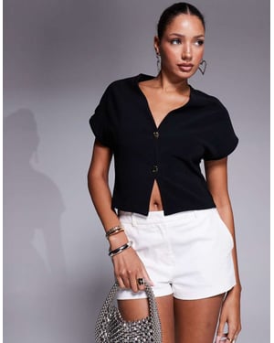 ASOS DESIGN short sleeve ribbed jersey waistcoat gold button trim in black