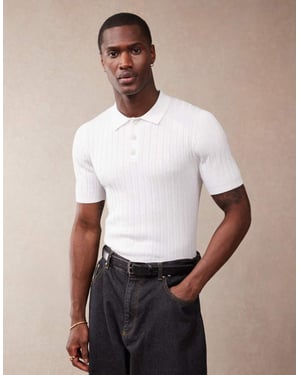 ASOS DESIGN muskelpassform stickad ribbad polo t-shirt i vitt