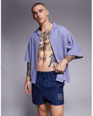 ASOS DESIGN badbyxor i kort längd med placeringstryck i marinblå