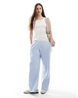 Hollister mid rise vida ben grafiska joggers i babyblå