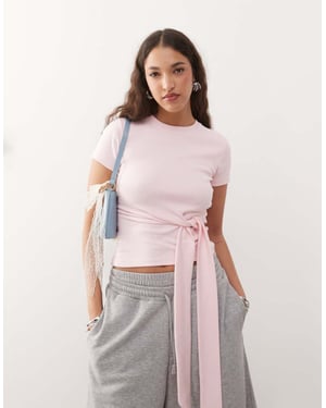 ASOS DESIGN kortärmad t-shirt med knyt i sidan i rosa
