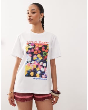 Återvunnen vintage oversized t-shirt med licensierad Monet blommönster i vitt