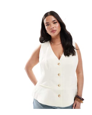 ASOS DESIGN Curve peplum väst i smörkräm