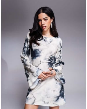 ASOS DESIGN snedhalsad minikjol i uppblåst blommönster