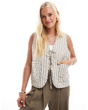 ONLY tie front quilted gilet in beige stripe