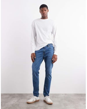 Levi's 512 slim tapered jeans i medelblå tvätt