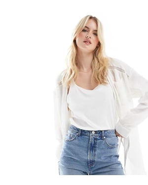 ASOS DESIGN Lång denim komfort mom shorts i medelblå
