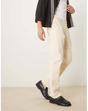 ASOS DESIGN slim flare smartbyxor i beige