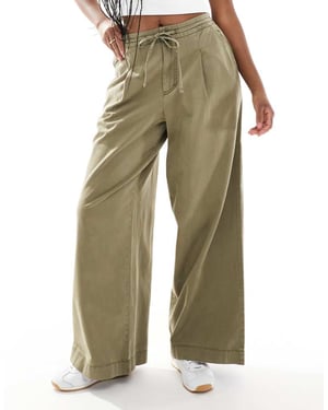ASOS DESIGN mjuka vida byxor i tvättad khaki