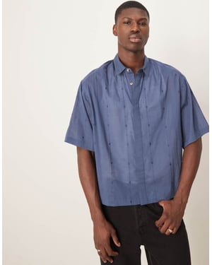 ASOS DESIGN boxig oversized skjorta med broderi i marinblå
