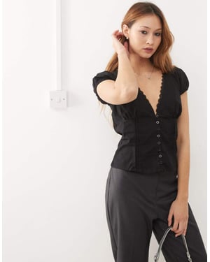 Motel ilias cinched waist shirt in black