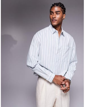 ASOS DESIGN boxig oversized skjorta i vit och blå randig