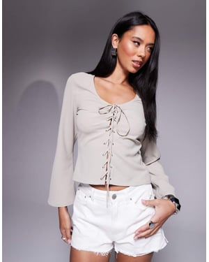 ASOS DESIGN lace up front long sleeve top in taupe